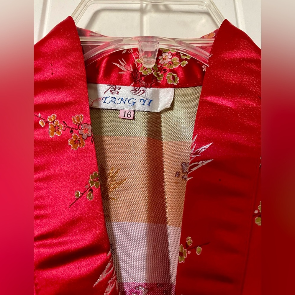 Red silky bathrobe size 16.